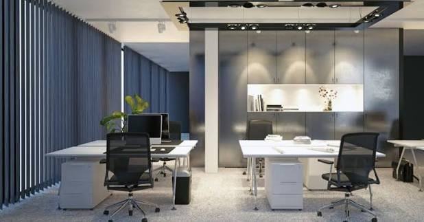 Bureau à Douala avec éclairage LED moderne installé, lumière homogène et confortable sur les postes
